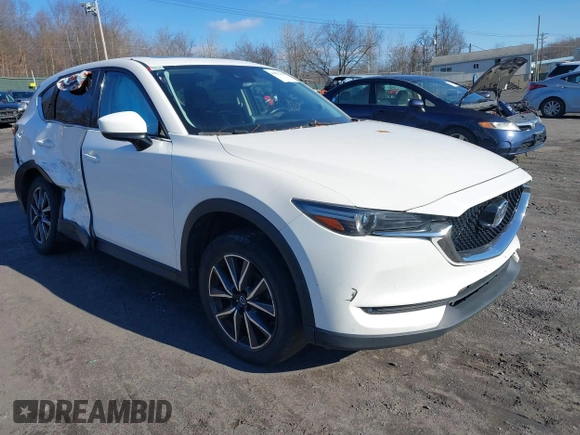 2017 Mazda CX-5 Grand Touring with VIN JM3KFBDL6H0188517, listed as a IAAI auction lot 41093178 with 98,831 mi miles. Bid and sale history available at carsss.com. Image 1.