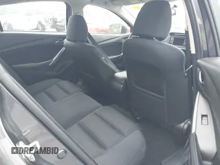 2014 Mazda 6 i Sport with VIN JM1GJ1U52E1102800, listed as a IAAI auction lot 42266283 with 103,886 mi miles and . Bid and sale history available at DreamBid. Image 8.