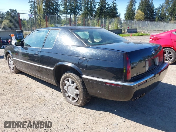 1998 Cadillac Eldorado Touring with VIN 1G6ET1295WU610253, listed as a IAAI auction lot 42066181 with 85,172 mi miles and . Bid and sale history available at DreamBid. Image 3.