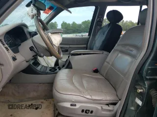 1998 Ford Explorer XLT with VIN 1FMZU32P8WZA91509, listed as a Copart auction lot 65531174 with 127,182 mi miles and Salvage title. Bid and sale history available at DreamBid. Image 7.