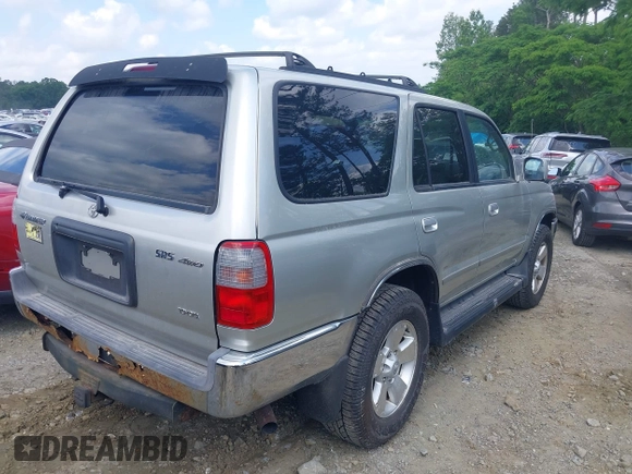 2000 Toyota 4Runner SR5 z VIN JT3HN86R1Y0296588, wystawiony jako IAAI lot #42193276 z przebiegiem 177 968 mil mil oraz . Historia ofert i sprzedaży dostępna na DreamBid. Obrazek 4.