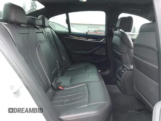 2019 BMW 5 Series 530e with VIN WBAJA9C57KB389401, listed as a IAAI auction lot 42565098 with 52,343 mi miles and . Bid and sale history available at DreamBid. Image 8.