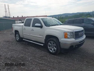 2013 GMC Sierra 1500 SLT with VIN 3GTP2WE71DG309690, listed as a IAAI auction lot 42613096 with 124,483 mi miles and . Bid and sale history available at DreamBid. Image 1.