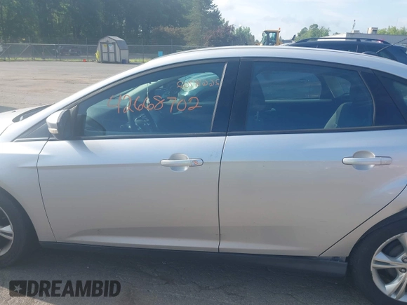 2013 Ford Focus SE with VIN 1FADP3F26DL249436, listed as a IAAI auction lot 42668702 with 79,182 mi miles and . Bid and sale history available at DreamBid. Image 14.