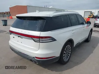 2020 Lincoln Aviator Reserve with VIN 5LM5J7WC1LGL28593, listed as a IAAI auction lot 42137327 with 83,114 mi miles and . Bid and sale history available at DreamBid. Image 4.