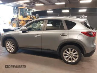 2014 Mazda CX-5 Grand Touring with VIN JM3KE4DY9E0373974, listed as a IAAI auction lot 42073693 with 86,755 mi miles. Bid and sale history available at carsss.com. Image 14.