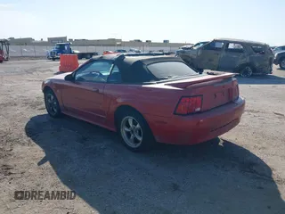 2001 Ford Mustang Deluxe with VIN 1FAFP44491F242798, listed as a IAAI auction lot 41779856 with 166,017 mi miles. Bid and sale history available at carsss.com. Image 3.