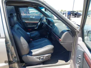1998 Jeep Grand Cherokee Limited z VIN 1J4GZ88Z4WC328450, wystawiony jako IAAI lot #42652126 z przebiegiem 166 576 mil mil oraz . Historia ofert i sprzedaży dostępna na DreamBid. Obrazek 5.