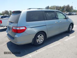 2005 Honda Odyssey EX with VIN 5FNRL38415B086709, listed as a IAAI auction lot 42308829 with 187,351 mi miles and . Bid and sale history available at DreamBid. Image 4.