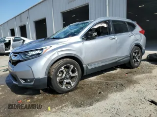 2018 Honda CR-V Touring with VIN 7FARW1H97JE040825, listed as a Copart auction lot 57089485 with 109,730 mi miles and Salvage title. Bid and sale history available at DreamBid. Image 1.