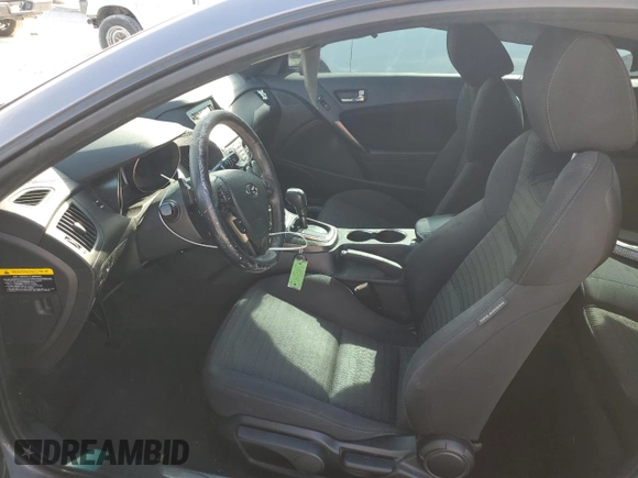 2013 Hyundai Genesis Coupe R-Spec z VIN KMHHT6KDXDU101716, wystawiony jako Copart lot #52415625 z przebiegiem 136 346 mil mil oraz Szkoda całkowita • Salvage title. Historia ofert i sprzedaży dostępna na DreamBid. Obrazek 7.