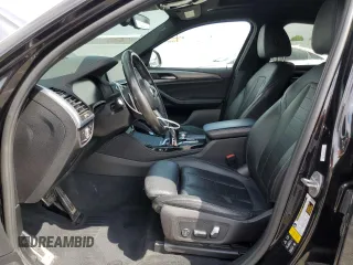 2020 BMW X4 xDrive30i z VIN 5UX2V1C0XL9B93562, wystawiony jako Copart lot #56180595 z przebiegiem 71 667 mil mil oraz Szkoda całkowita • Salvage title. Historia ofert i sprzedaży dostępna na DreamBid. Obrazek 7.