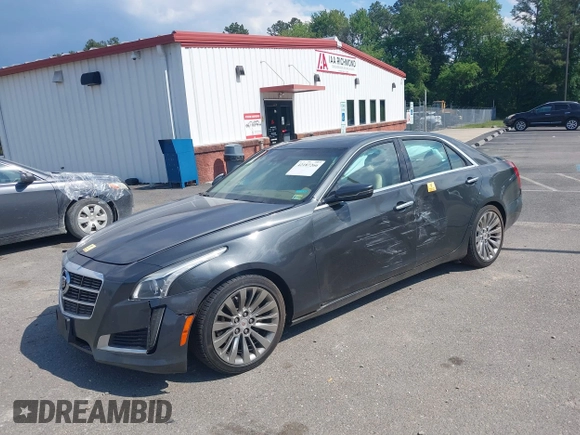 2014 Cadillac CTS Luxury AWD z VIN 1G6AX5SX7E0173466, wystawiony jako IAAI lot #42187266 z przebiegiem 115 140 mil mil oraz . Historia ofert i sprzedaży dostępna na DreamBid. Obrazek 16.