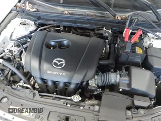 2021 Mazda 3 Premium with VIN JM1BPBML6M1348258, listed as a IAAI auction lot 42752477 with 35,285 mi miles and . Bid and sale history available at DreamBid. Image 10.