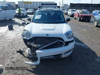 2020 MINI Countryman Cooper S z VIN WMZYX1C06L3M01166, wystawiony jako IAAI lot #41540885 z przebiegiem 37 008 mil mil oraz . Historia ofert i sprzedaży dostępna na DreamBid. Obrazek 11.