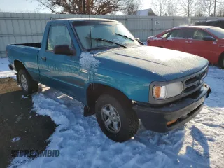 1996 Mazda B-Series 2WD Truck with VIN 4F4CR12A9TTM45488, listed as a Copart auction lot 42214795 with 137,409 mi miles and Salvage Title. Bid and sale history available at carsss.com. Image 4.
