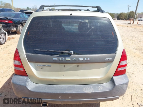 2003 Subaru Forester X z VIN JF1SG63613H715162, wystawiony jako IAAI lot #41897812 z przebiegiem 163 895 mil mil oraz . Historia ofert i sprzedaży dostępna na DreamBid. Obrazek 16.