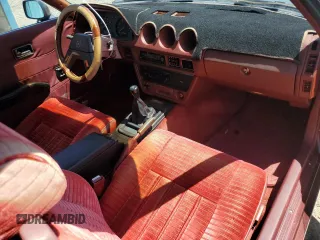 1982 Datsun 280ZX 2+2 z VIN JN1HZ06S5CX429361, wystawiony jako Copart lot #59239365 z przebiegiem 139 002 mil mil oraz Tytuł czysty. Historia ofert i sprzedaży dostępna na DreamBid. Obrazek 8.