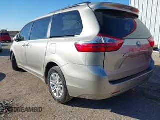 2015 Toyota Sienna XLE with VIN 5TDYK3DC8FS547056, listed as a IAAI auction lot 41387793 with 140,767 mi miles and . Bid and sale history available at DreamBid. Image 3.