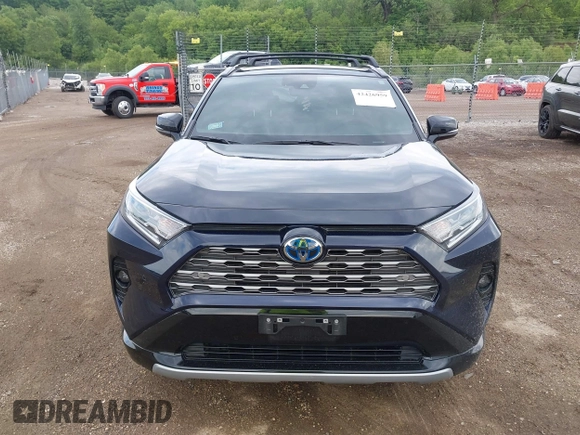 2021 Toyota RAV4 Hybrid XSE with VIN 4T3E6RFV0MU053245, listed as a IAAI auction lot 42426959 with 28,717 mi miles and . Bid and sale history available at DreamBid. Image 12.