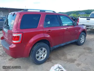 2012 Ford Escape Limited with VIN 1FMCU0E75CKB62654, listed as a IAAI auction lot 39674713 with 115,272 mi miles. Bid and sale history available at carsss.com. Image 4.