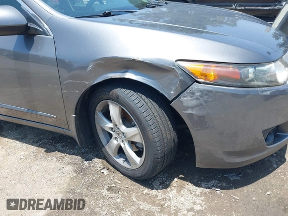 2010 Acura TSX z VIN JH4CU2F64AC033946, wystawiony jako IAAI lot #42544399 z przebiegiem 120 477 mil mil oraz . Historia ofert i sprzedaży dostępna na DreamBid. Obrazek 6.