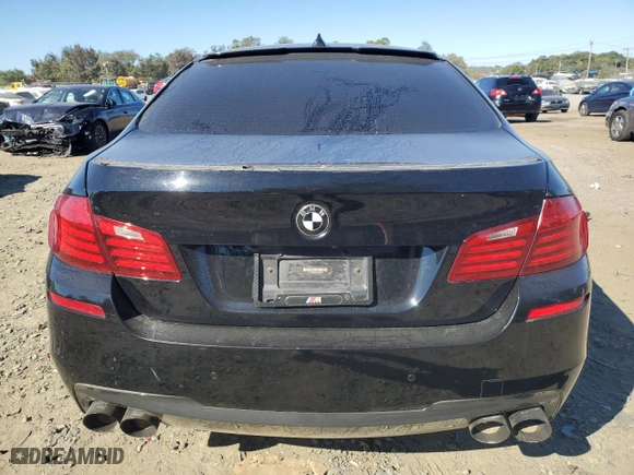 2016 BMW 5 Series 550i xDrive with VIN WBAKP9C58GG587806, listed as a Copart auction lot 76317094 with 127,918 mi miles and Salvage Title. Bid and sale history available at carsss.com. Image 6.