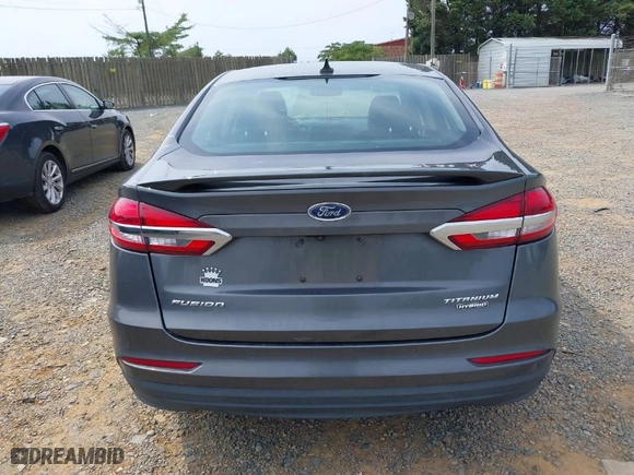 2020 Ford Fusion Hybrid Titanium with VIN 3FA6P0RU0LR141494, listed as a IAAI auction lot 39967898 with 88,152 mi miles. Bid and sale history available at carsss.com. Image 17.