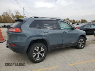 2015 Jeep Cherokee Trailhawk with VIN 1C4PJMBS0FW578199, listed as a Copart auction lot 77538544 with 122,444 mi miles and Salvage Title. Bid and sale history available at carsss.com. Image 3.