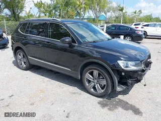 2021 Volkswagen Tiguan SE with VIN 3VV2B7AX1MM150534, listed as a IAAI auction lot 41814162 with 49,079 mi miles. Bid and sale history available at carsss.com. Image 1.