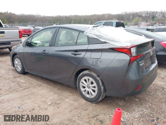 2021 Toyota Prius L Eco with VIN JTDKAMFU6M3140081, listed as a IAAI auction lot 42131187 with 103,973 mi miles and . Bid and sale history available at DreamBid. Image 3.