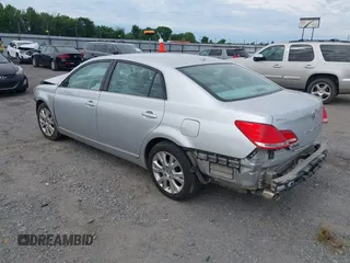 2010 Toyota Avalon XL with VIN 4T1BK3DB6AU369581, listed as a IAAI auction lot 42159063 with 137,996 mi miles and . Bid and sale history available at carsss.com. Image 3.