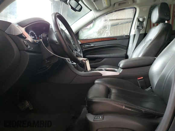 2014 Cadillac SRX Luxury Collection z VIN 3GYFNEE39ES681183, wystawiony jako Copart lot #57165295 z przebiegiem 110 780 mil mil oraz Szkoda całkowita • Salvage title. Historia ofert i sprzedaży dostępna na DreamBid. Obrazek 7.