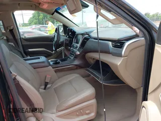 2019 Chevrolet Tahoe LT z VIN 1GNSKBKC5KR388869, wystawiony jako IAAI lot #42354451 z przebiegiem 111 359 mil mil oraz . Historia ofert i sprzedaży dostępna na DreamBid. Obrazek 5.