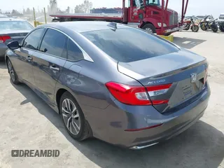2020 Honda Accord with VIN 1HGCV3F11LA015901, listed as a IAAI auction lot 42022659 with 131,865 mi miles and . Bid and sale history available at DreamBid. Image 3.