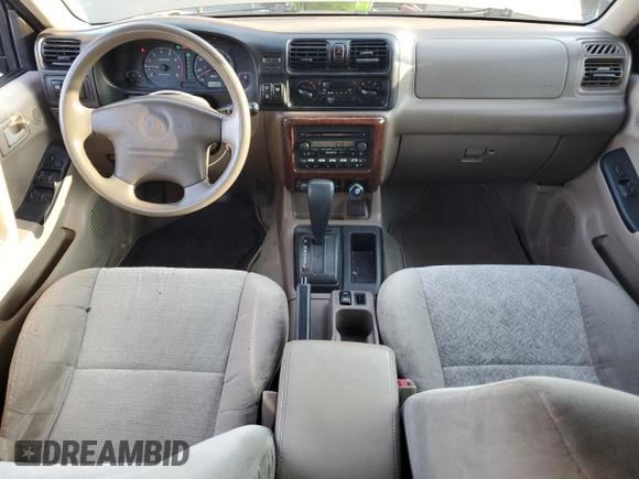 2001 Isuzu Rodeo S with VIN 4S2CK58W314334096, listed as a Copart auction lot 68262924 with 140,657 mi miles and Salvage Title. Bid and sale history available at DreamBid. Image 8.