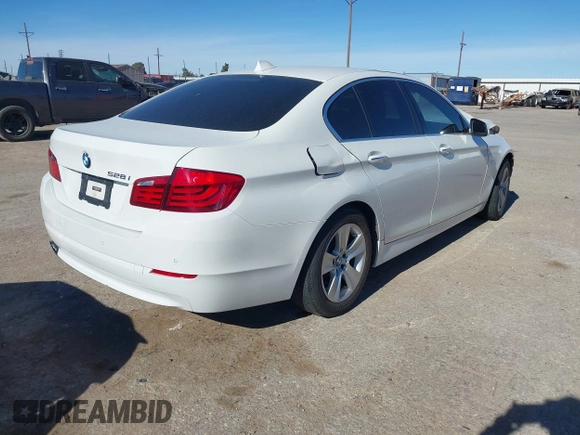 2013 BMW 5 Series 528i with VIN WBAXG5C59DDY32432, listed as a IAAI auction lot 41230673 with 103,069 mi miles and . Bid and sale history available at carsss.com. Image 4.