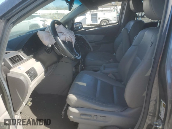 2013 Honda Odyssey EX-L with VIN 5FNRL5H6XDB015049, listed as a Copart auction lot 48691415 with 150,480 mi miles and Salvage Title. Bid and sale history available at DreamBid. Image 7.