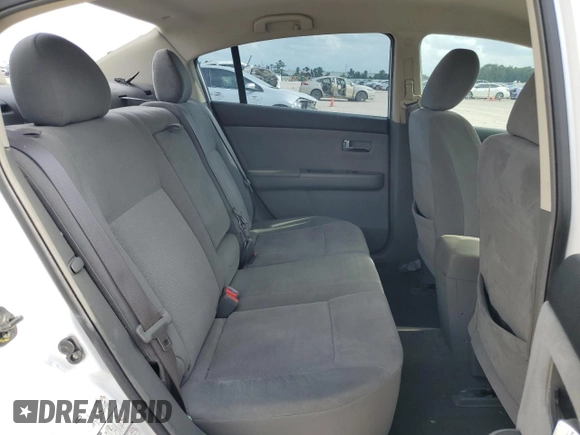 2009 Nissan Sentra SL с VIN 3N1AB61E29L666386, выставлен на аукционе Copart как лот 54661595 с пробегом 74 887 миль миль и Списание • Salvage title. История ставок и продаж доступна на DreamBid. Изображение 11.