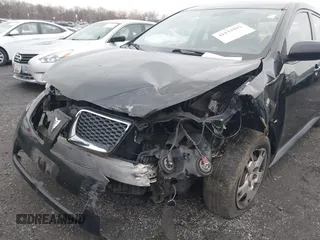 2010 Pontiac Vibe w/1SB with VIN 5Y2SP6E03AZ404584, listed as a IAAI auction lot 41133592 with 199,271 mi miles. Bid and sale history available at carsss.com. Image 6.