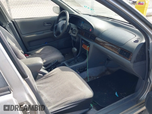 1995 Nissan Altima XE with VIN 1N4BU31D5SC101493, listed as a IAAI auction lot 41913245 with 224,199 mi miles. Bid and sale history available at carsss.com. Image 5.