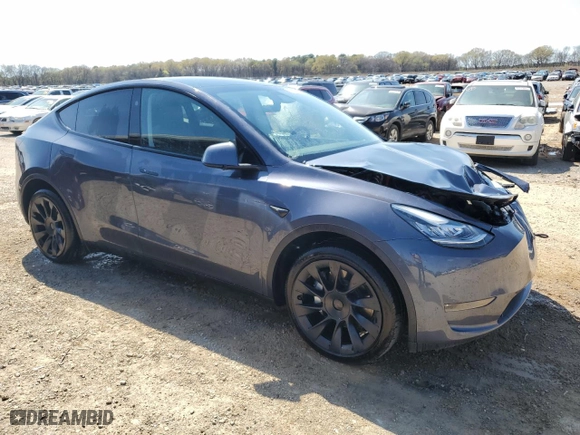 2023 Tesla Model Y Long Range with VIN 7SAYGDEE5PA159439, listed as a Copart auction lot 50743885 with 28,505 mi miles and Salvage Title. Bid and sale history available at carsss.com. Image 4.