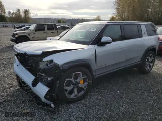 2023 Rivian R1S Adventure with VIN 7PDSGABAXPN019516, listed as a Copart auction lot 73248104 with 11,525 mi miles and Salvage Title. Bid and sale history available at carsss.com. Image 1.
