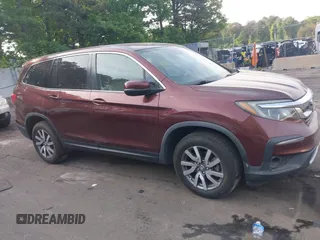 2019 Honda Pilot EX-L z VIN 5FNYF5H5XKB045563, wystawiony jako IAAI lot #42329311 z przebiegiem 46 903 mil mil oraz . Historia ofert i sprzedaży dostępna na DreamBid. Obrazek 13.