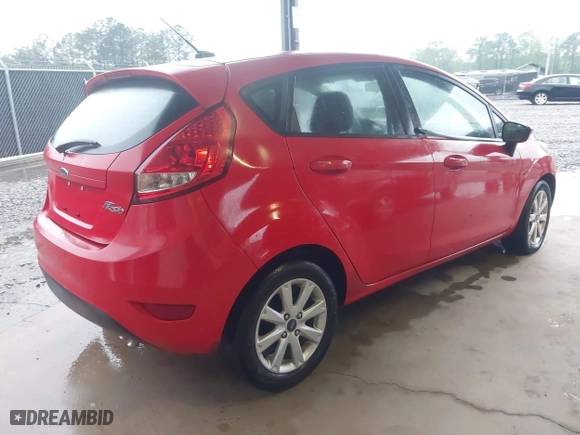 2012 Ford Fiesta SE with VIN 3FADP4EJ4CM215670, listed as a IAAI auction lot 41980900 with 87,874 mi miles. Bid and sale history available at carsss.com. Image 4.