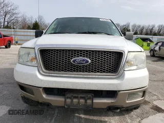 2005 Ford F-150 XLT with VIN 1FTPW14565KE92649, listed as a Copart auction lot 51474055 with 299,766 mi miles and Salvage Title. Bid and sale history available at carsss.com. Image 5.