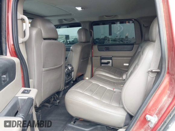 2003 Hummer H2 with VIN 5GRGN23U13H128617, listed as a IAAI auction lot 41494349 with 135,295 mi miles. Bid and sale history available at carsss.com. Image 8.