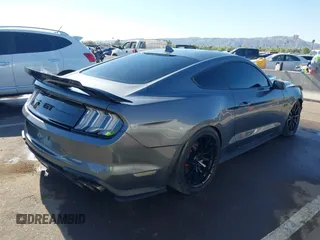 2021 Ford Mustang GT with VIN 1FA6P8CF0M5148961, listed as a IAAI auction lot 42211976 with 14,181 mi miles and . Bid and sale history available at DreamBid. Image 4.