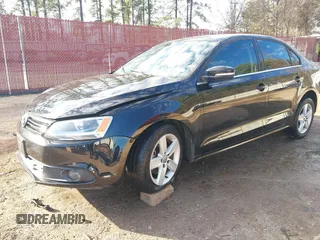 2012 Volkswagen Jetta TDI w/Premium with VIN 3VWLL7AJ2CM426050, listed as a IAAI auction lot 41332817 with 111,996 mi miles and . Bid and sale history available at DreamBid. Image 17.