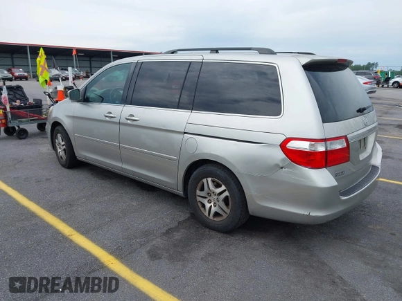 2007 Honda Odyssey EX-L z VIN 5FNRL38647B426620, wystawiony jako IAAI lot #42059093 z przebiegiem 258 622 mil mil oraz . Historia ofert i sprzedaży dostępna na DreamBid. Obrazek 3.